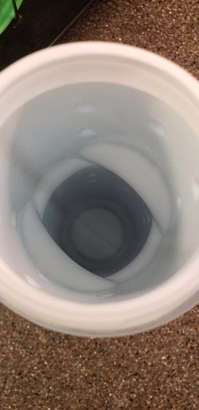 Inner plastic layer is extremely ridgid. Does not squeeze. The outer plastic layer has some give, but runs up against the inner layer, with the actual water in it. Due to the rigid inner layer, it is impossible to squeeze water out or suck it out.