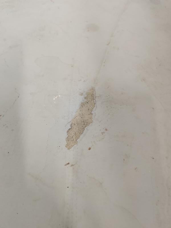 Missing epoxy where bike tire rested on the surface