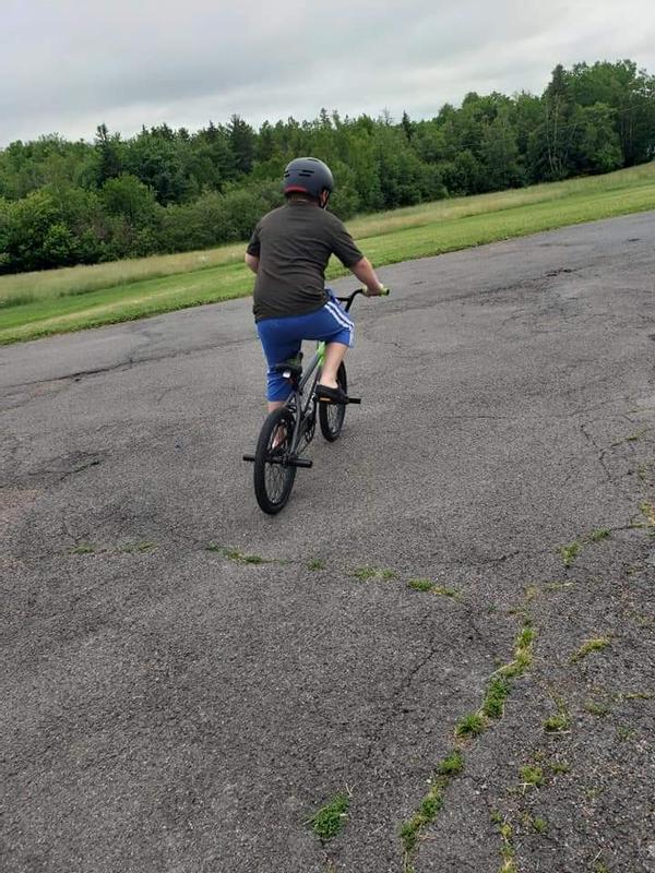 My son trying gis Bmx out for the 1st time