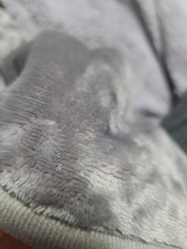 Plastic beads that pop out if you press on the fabic