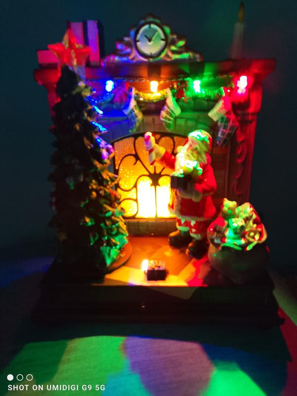 Santa at the fireplace