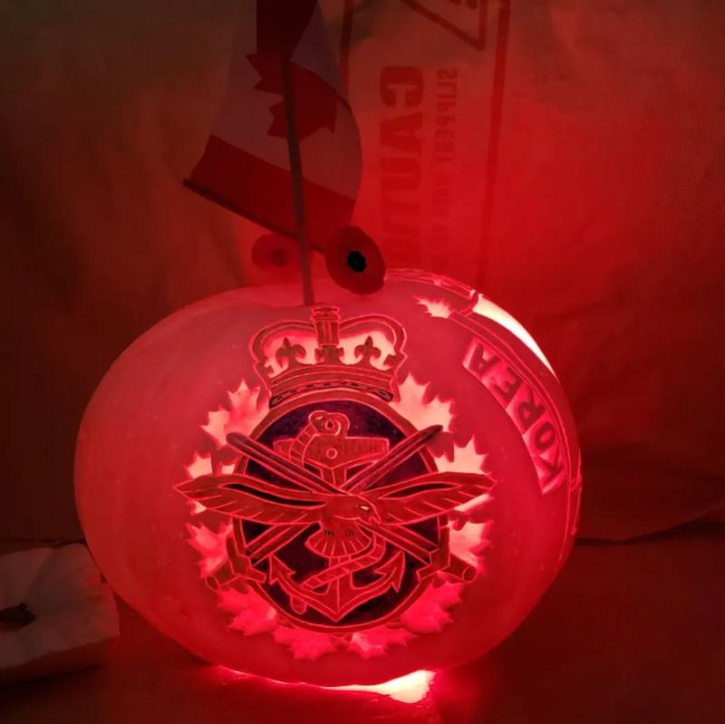 Remembrance Day Pumpkin - White Pumpkin - Carved & Painted and Lit with Red Light.