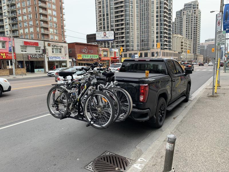 Four adult bikes, no contact with truck