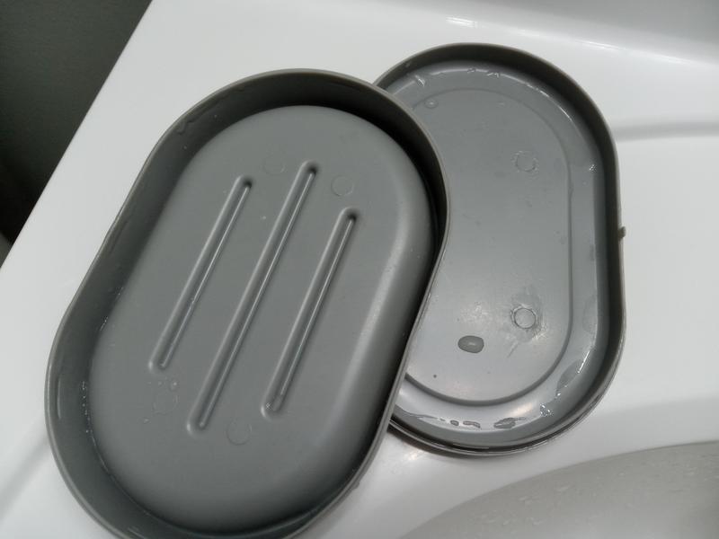 Inside of the soap dish after I pry it open. It gets a little wet in there every time I wash it.