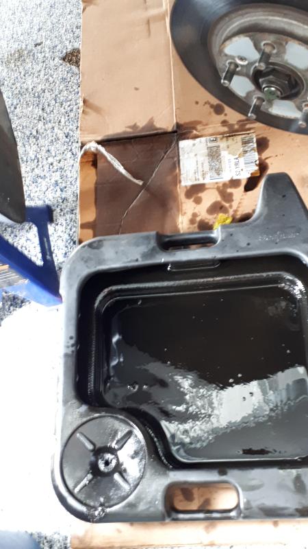 Notice small hole in filter perch that I drilled out and the mess.