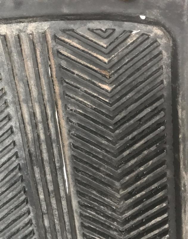 small holes: top right, big slit: centre