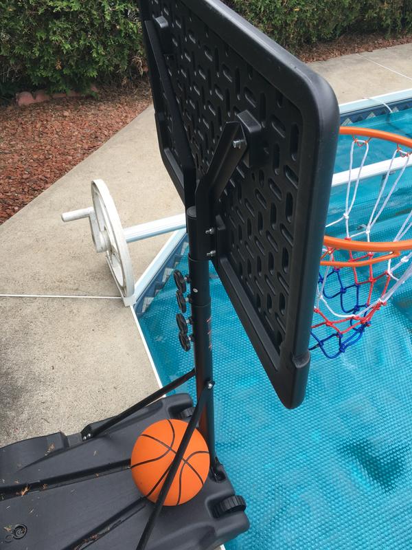 Poles inserted the lowest setting without the pre-drilled holes.