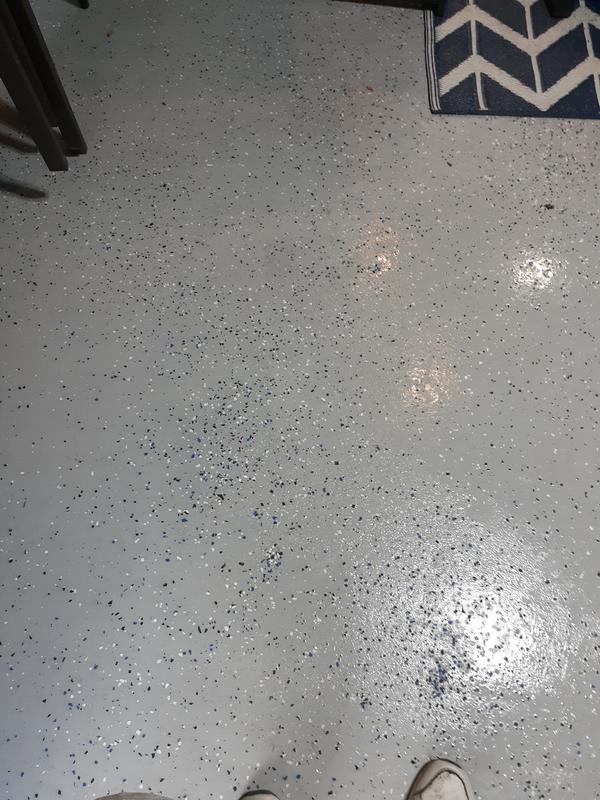 Repaired floor with expoxy coating