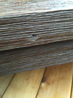 Dented wood on the table