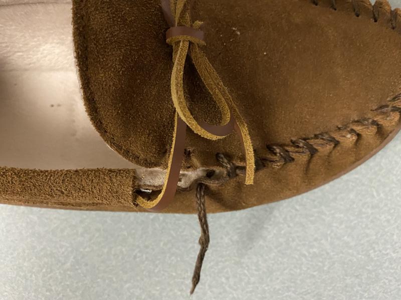 Lacing fell out of top two stitches.