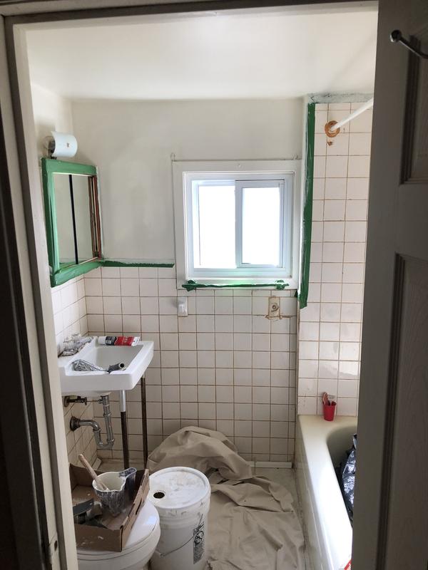 Used the brush to paint window trim and sensitive areas