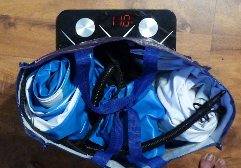 In a shopping bag with a pump, 11lbs total.