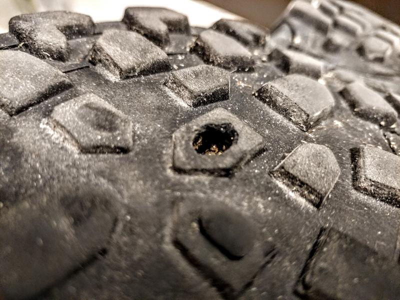 All these lugs are waiting to pop right open. Waterproof? Not nearly.