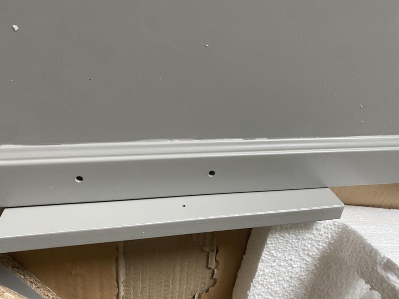 Trim edge of one of the outside sides of the cabinet