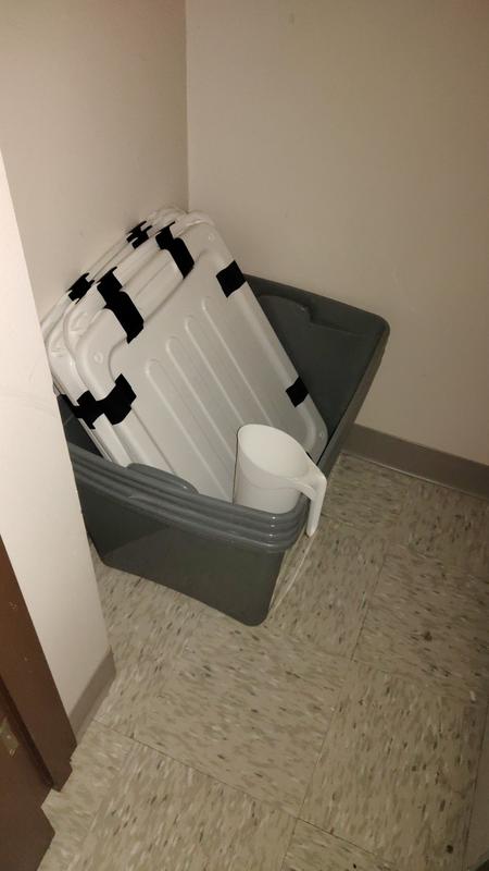 Stored nested in a closet, milk jug for scale.