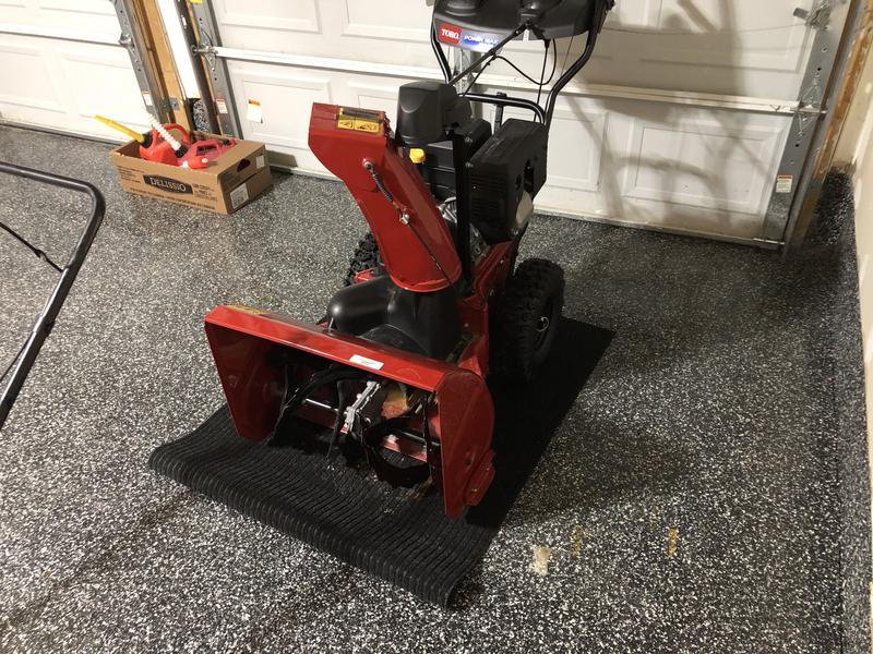 Snowblower on mat