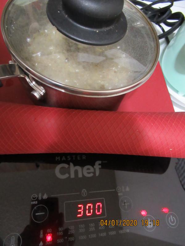 I use silicone baking sheets on the top to prevent scratching the cooktop. At the lowest setting (300W), this sauce is at full boil.