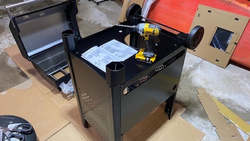 Garage with cardboard on the ground for assembly area