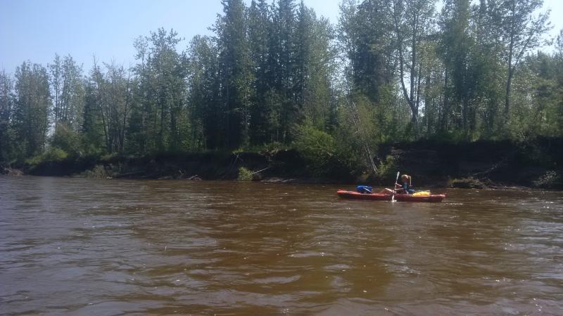 Paddling the McLeod River, Alberta.