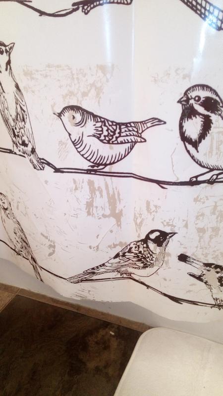 Base of the curtain when hanging outside the tub.