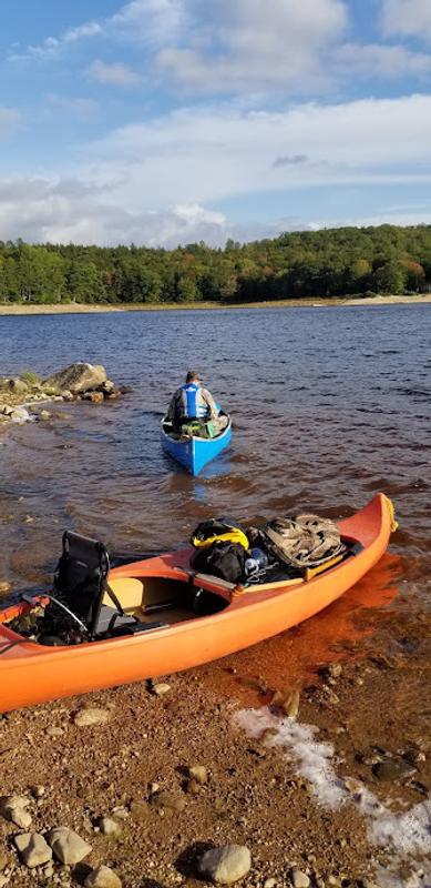 Canoe seat on orange canoe