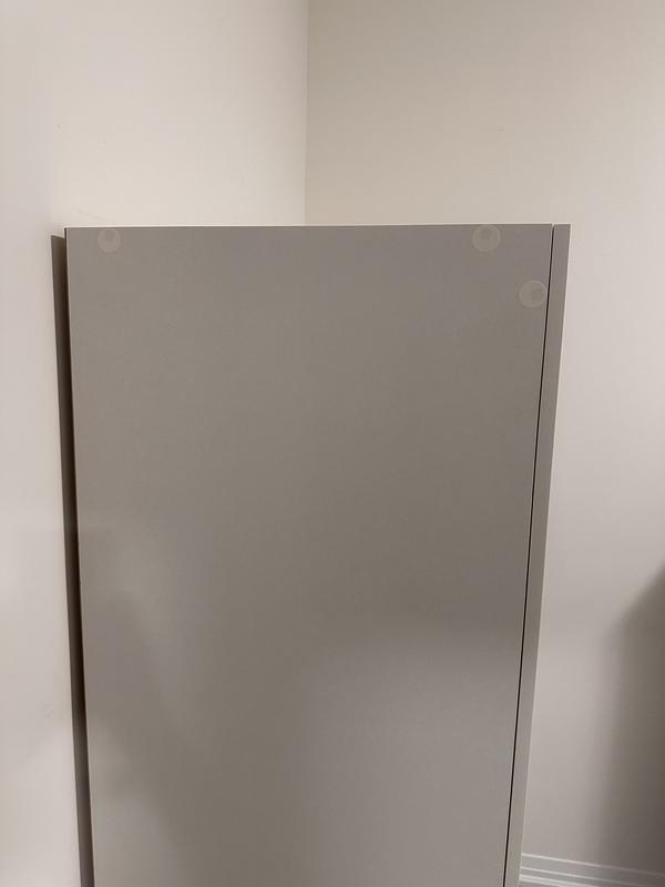 Stickers to cover the hole does not match the colour of wardrobe looks cheap