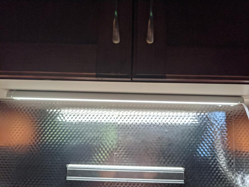 Light reflects the back splash.