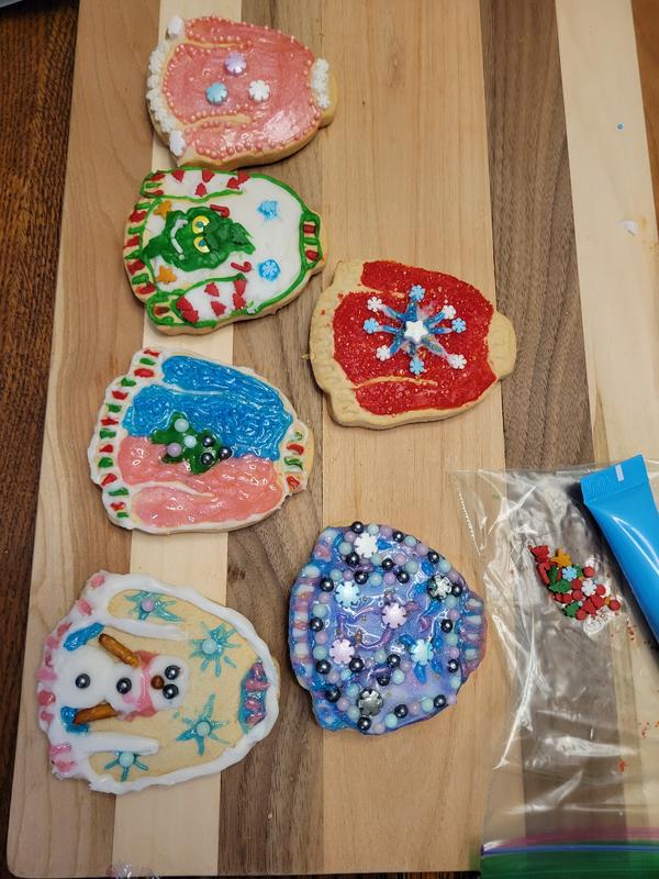 I added pink and blue icing along with other of the sprinkles..