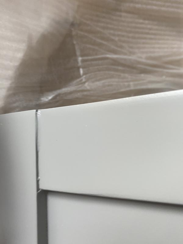 Glue over flow painted over.  This is the outside part of the door