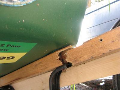 Broken handle was temporarily mended by nailing a 2x4 to it