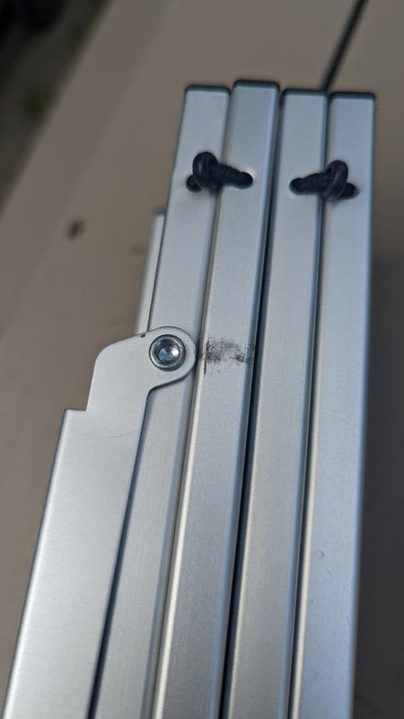 The hinge for the leg sticks up higher than the top and causes damage.