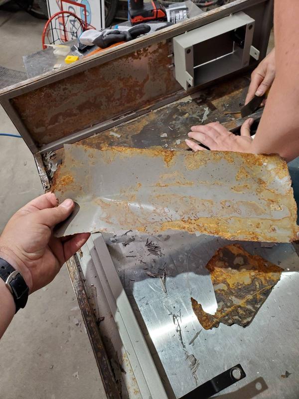 Peeling full sheets off in some places.