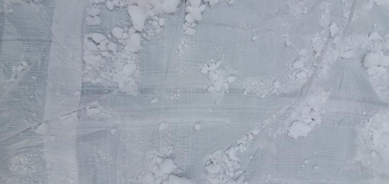 You can see the darker strips with improper weave