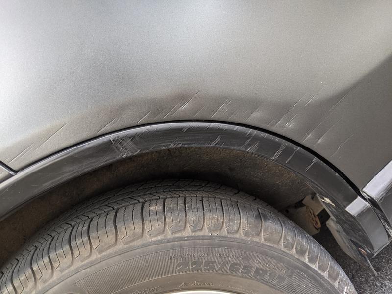 After sanding, filler primer, paint, and clear coat