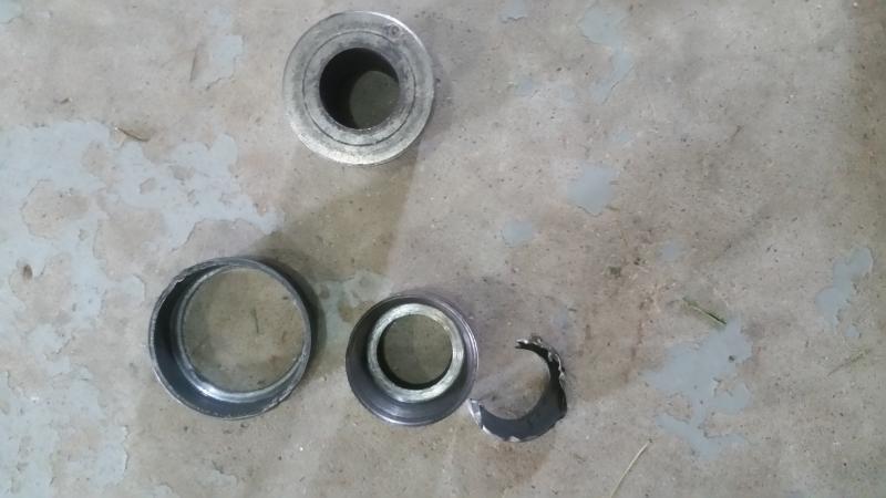 Top what should look like bottom what was left of inner wheel bearing/bushing