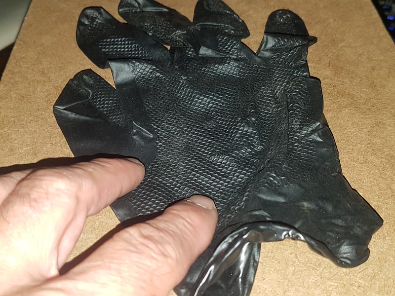 Notice Textured Surface on Gloves I like (First Picture)