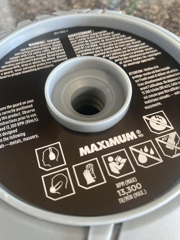 La deuxième photo, le centre devrait avoir des filets pour recevoir un autre contenant de meules