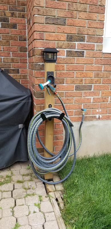 4x4 post, metal spike in the ground, with a solar light