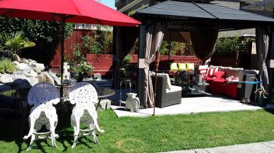 umbrella is behind gazebo