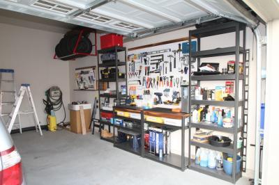 Right side of garage entrance.