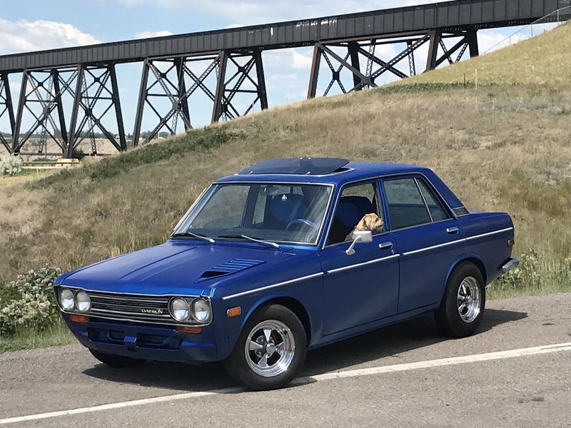 2095 Tahoe 239000km ‘73 Datsun 510 70900 miles