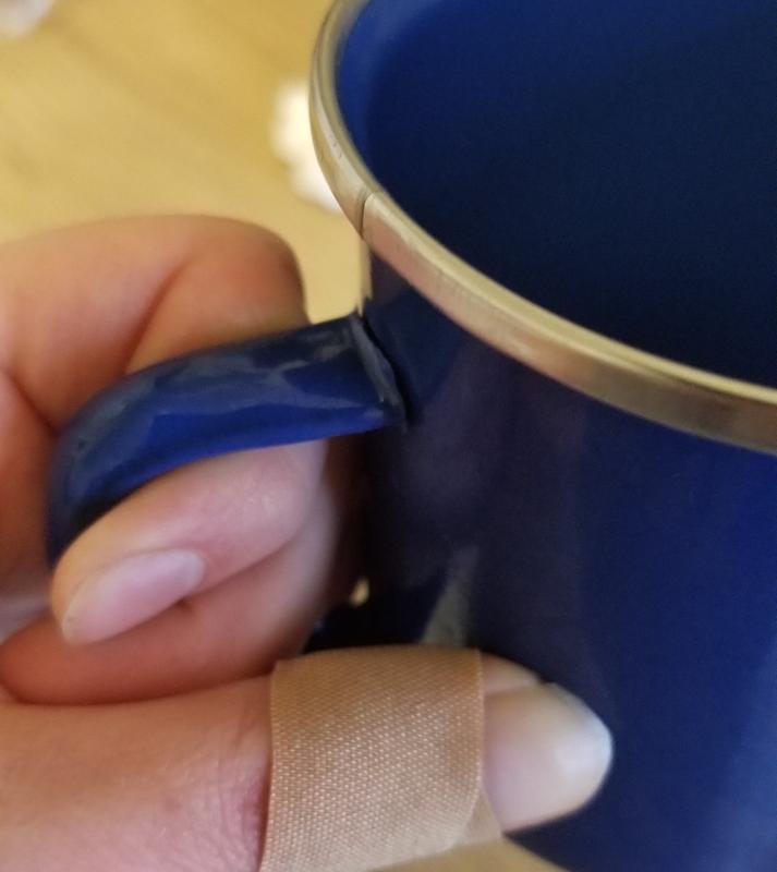 Busted mug and thumb