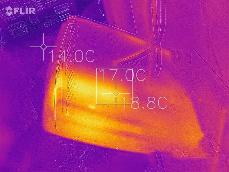 Back side of the thermostat.  This could likely be why it was showing 16.5 degrees when it was only 14 or less in the background.  Heat was off.