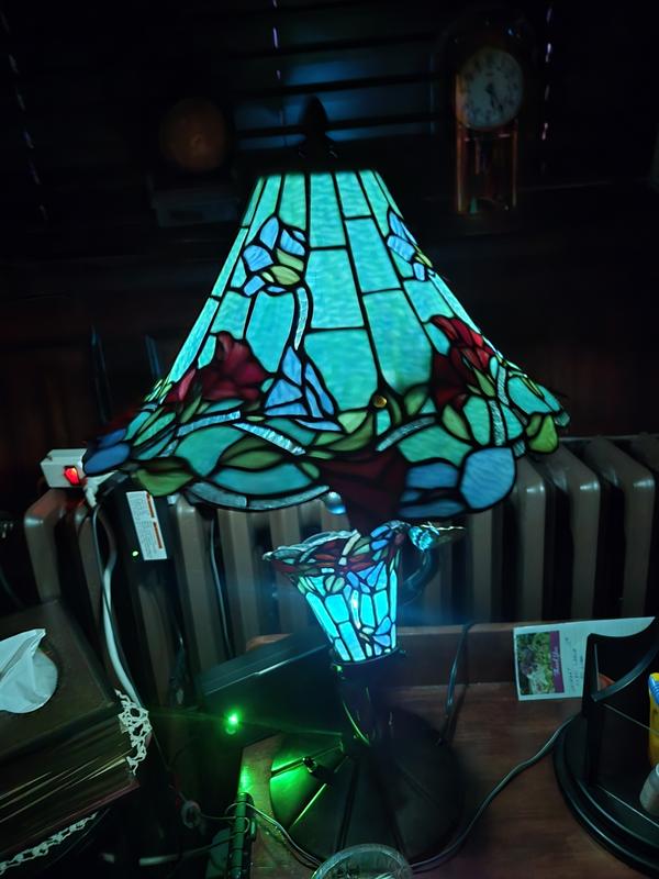 Tiffany-style lamp with coloured bulbs in base