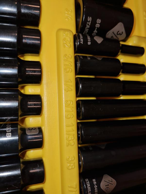 Black discoloration and smudges on the yellow inner lining and fingerprints and bad finish on individual pieces..