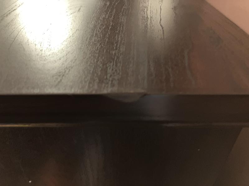 Scratched and damaged on one end.