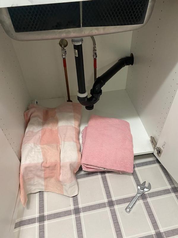 preparing under the sink