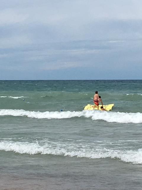 Surfing Lake Huron on the floater mat!!