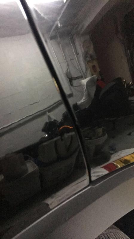 Close up of the parking lot door ding (dent along the body line).