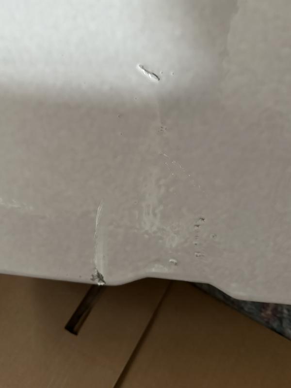 Gouges and scratches to finish on back of bowl, right out of the box